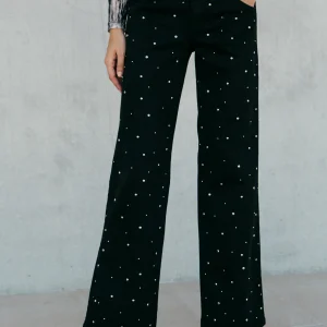 Jean Gabriel en denim noir à clous